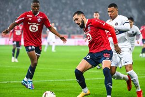 Kylian MBAPPE of Paris SG and Nabil BENTALEB of Lille during the Ligue 1 Uber Eats match between LOSC Lille and Paris Saint-Germain Football Club at Stade Pierre Mauroy on December 17, 2023 in Lille, France. (Photo by Anthony Dibon/Icon Sport)